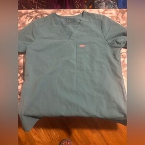 FIGS women’s scrub top marine color